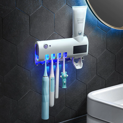 UV Light Sterilizer Toothbrush Holder Cleaner & Automatic Toothpaste Dispenser with toothbrushes and toothpaste in a bathroom setting.