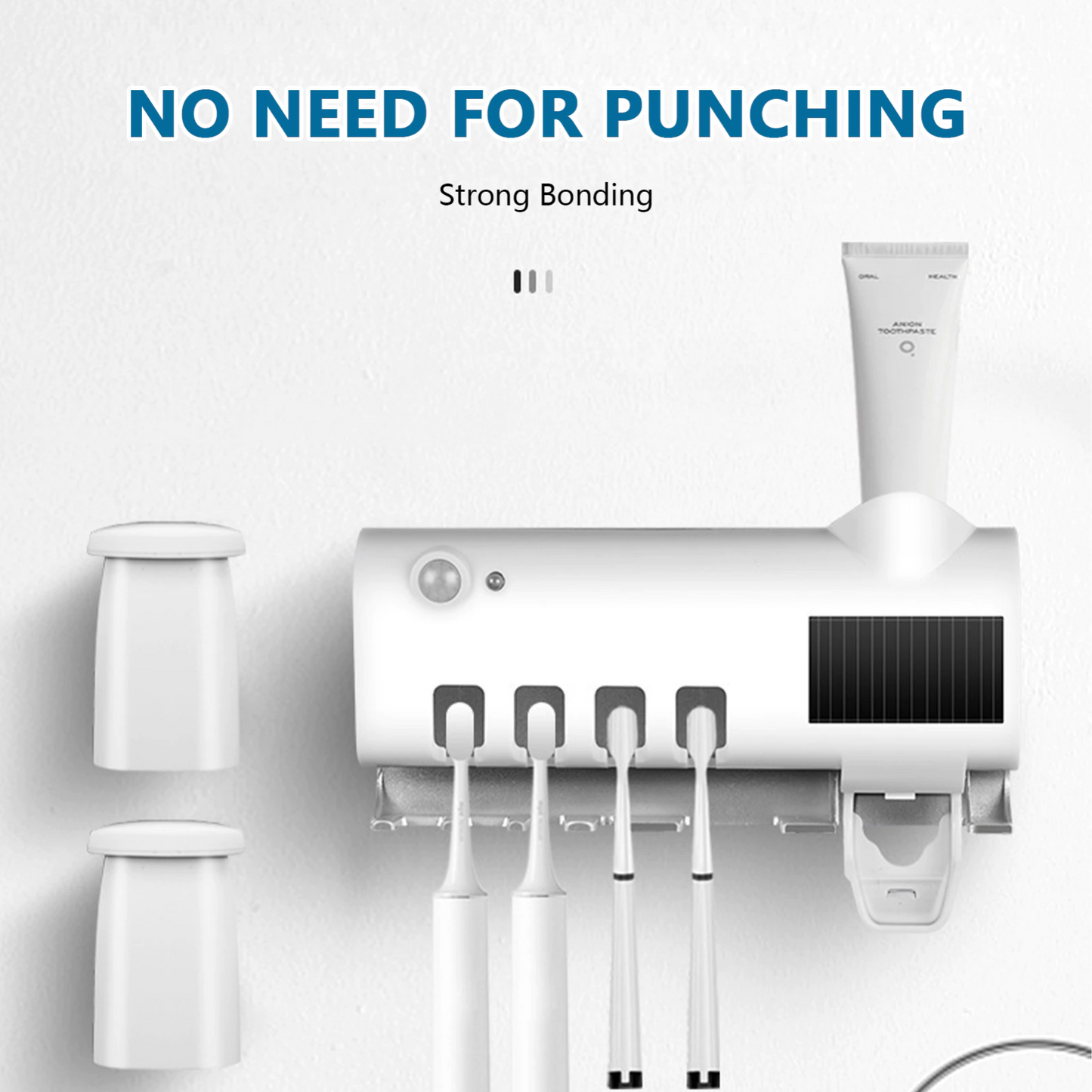 UV Light Sterilizer Toothbrush Holder Cleaner & Automatic Toothpaste Dispenser mounted on a wall with toothbrushes and cups.
