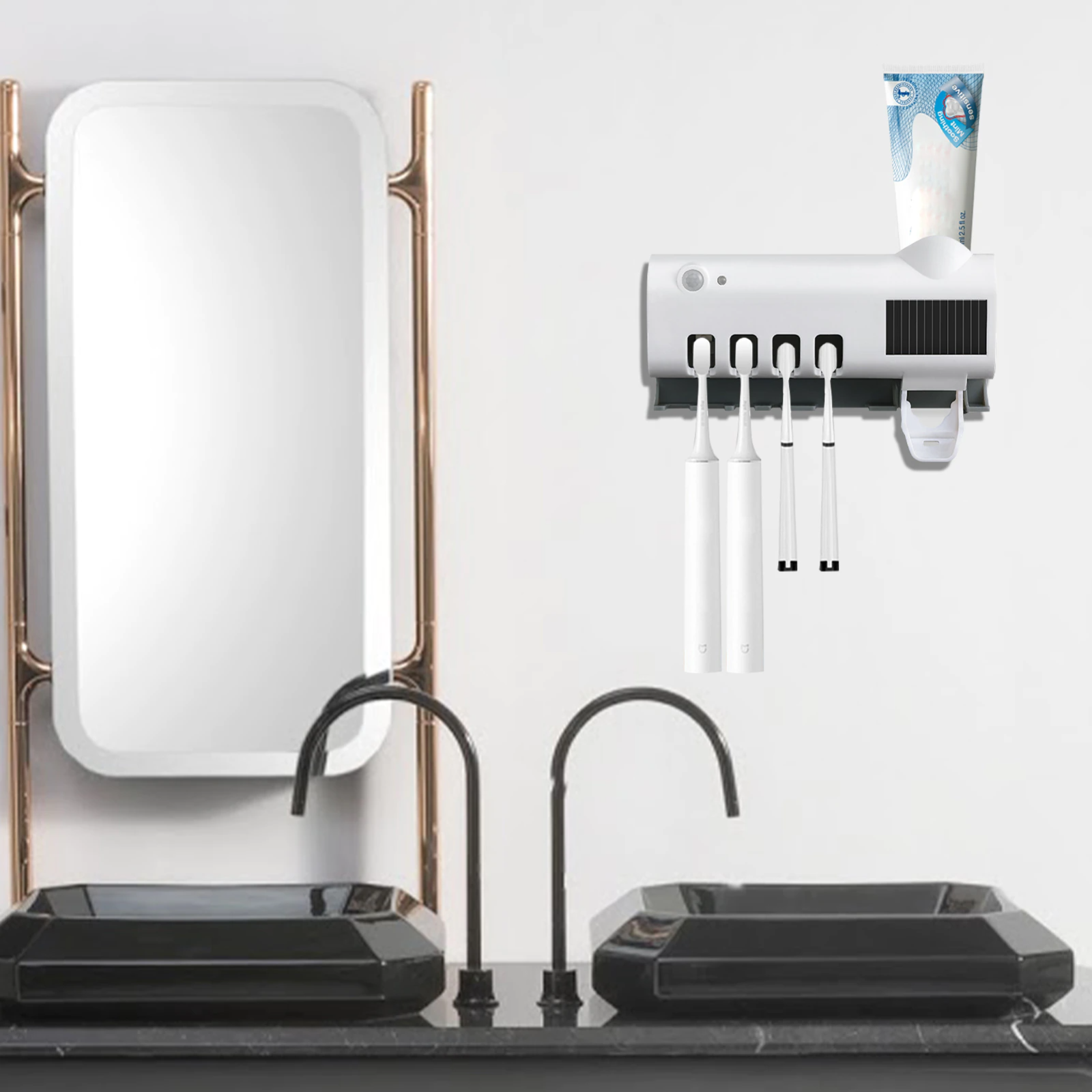 UV Light Sterilizer Toothbrush Holder Cleaner & Automatic Toothpaste Dispenser mounted above a stylish bathroom sink.