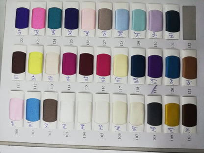 Color swatches of fabric samples showcasing various shades for mermaid evening dresses.