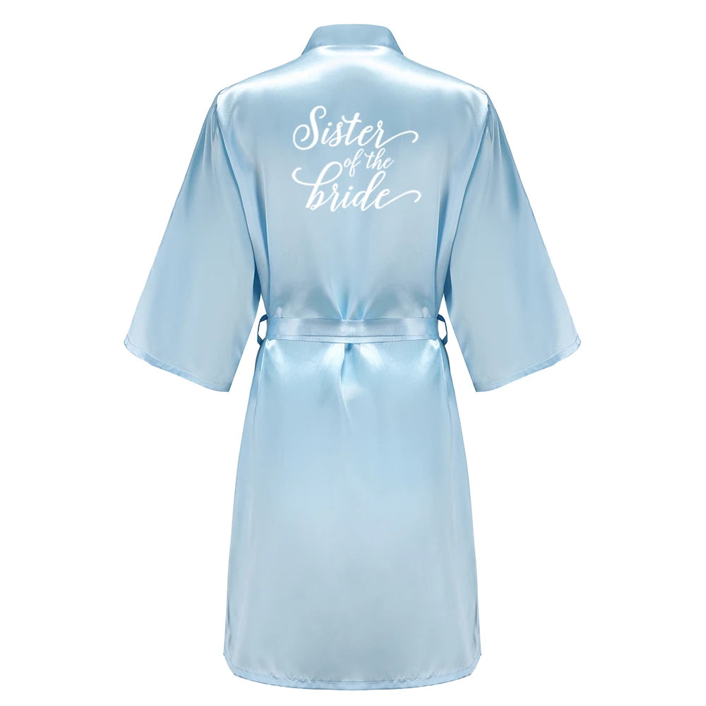 Light blue women's satin robe with 'Sister of the Bride' lettering, perfect for wedding party satin robe.