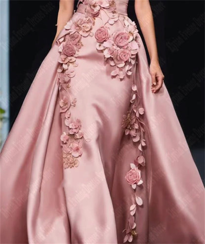 Elegant evening dresses with 3D flowers featuring a satin fabric and floral appliques in a stunning gown.