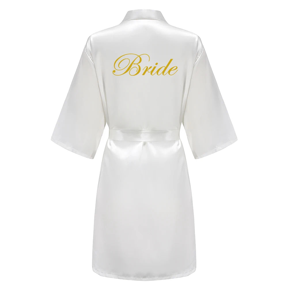 Bridal satin robe with gold 'Bride' lettering for wedding parties, perfect for bridesmaid satin robes.