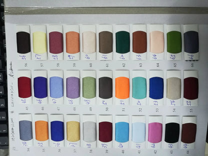 Color swatches for fabric selection showcasing various shades for mermaid evening dresses.
