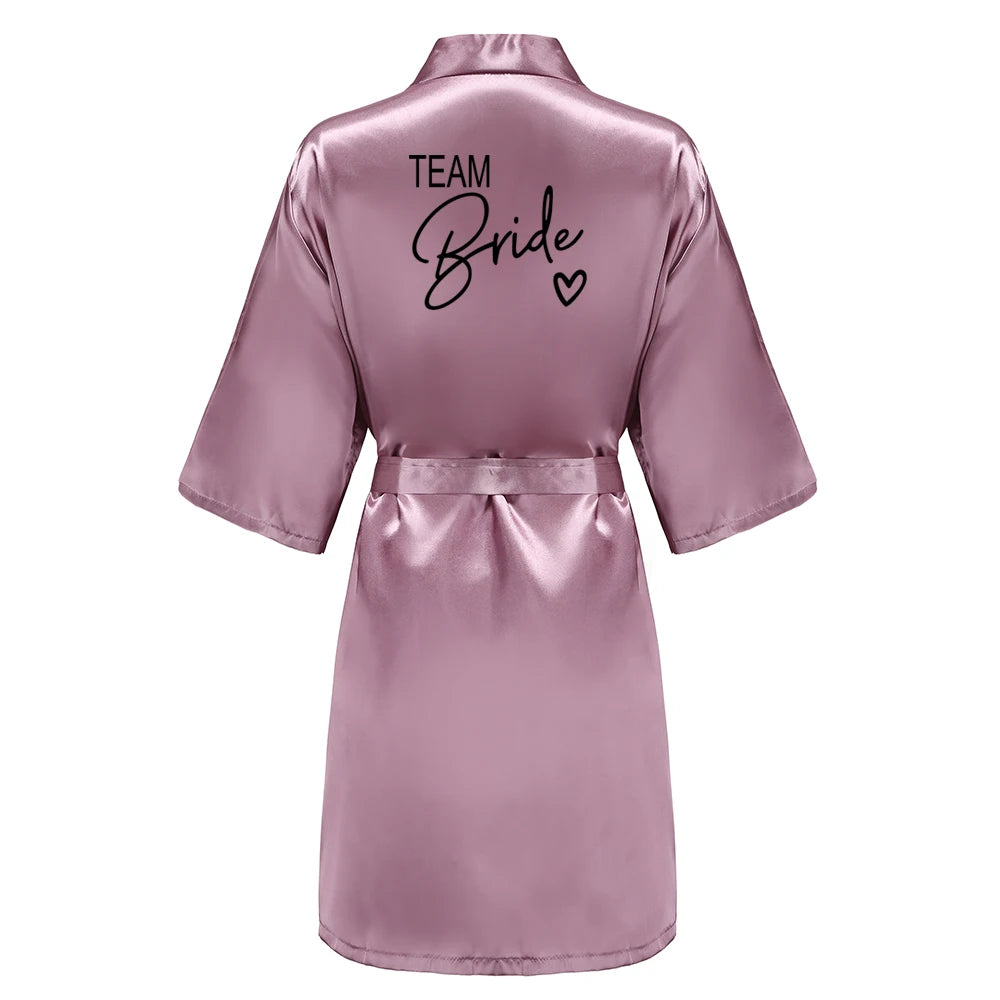 Back view of a satin robe with 'TEAM Bride' lettering, perfect for bridesmaid satin robes in wedding celebrations.