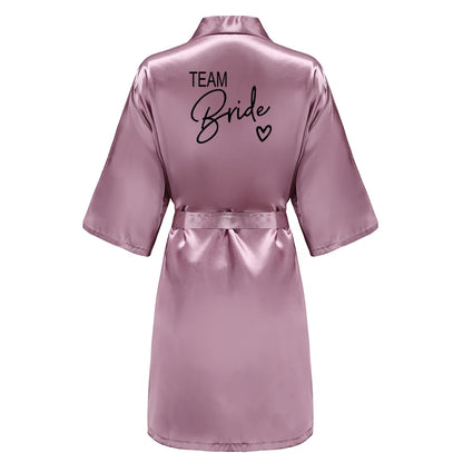 Back view of a satin robe with 'TEAM Bride' lettering, perfect for bridesmaid satin robes in wedding celebrations.