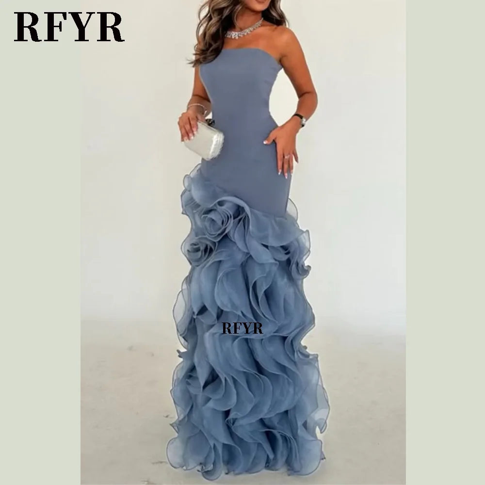 Asymmetrical prom gown in blue with tiered ruffles, perfect for formal occasions and evening events.