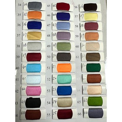 Color swatch chart showcasing various fabric hues for custom evening dress options.