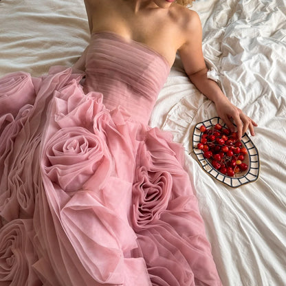 Amanda Customized light pink strapless prom dress with 3D rose ruffles, featuring sheer fabric and a romantic look.