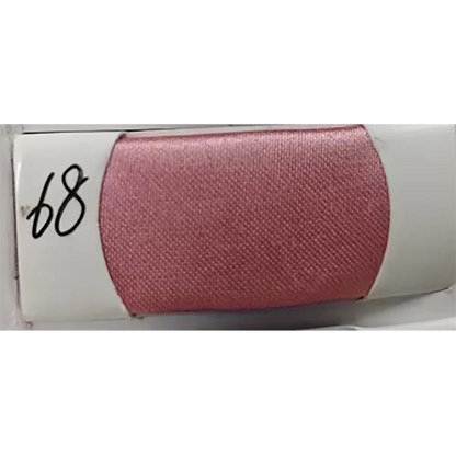 A spool of pink fabric numbered 68, showcasing a soft texture and vibrant color, perfect for craft projects.