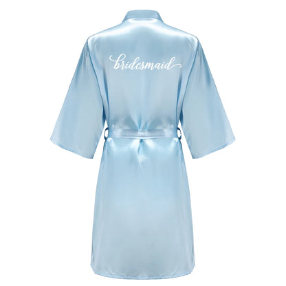 Light blue women's satin robe for bridesmaid, featuring elegant white lettering, perfect for wedding party satin robe.