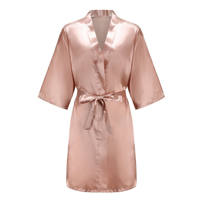 Bridesmaid satin robes in soft pink satin fabric with a tie waist and half sleeves, perfect for wedding parties.