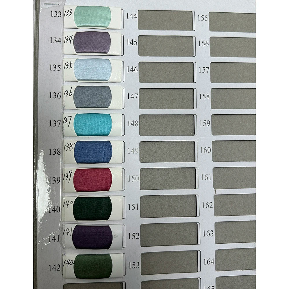 Color swatches featuring various shades including green, blue, purple, and pink for fabric selection.