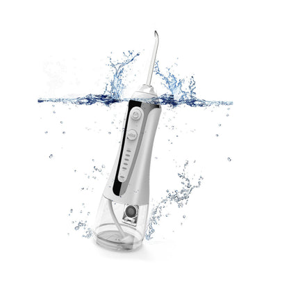 Portable Water Flosser And Pik For Dental Hygiene in action with water splash background.